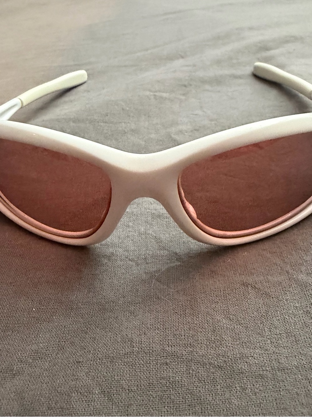 White Oakley Encounter Women's Sunglasses with Rose Gold tinted Lenses